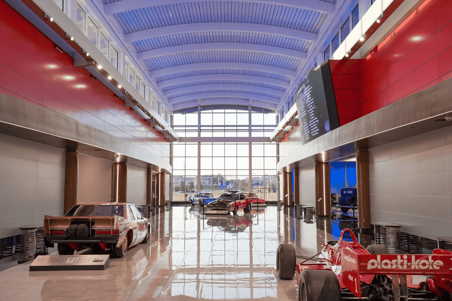 Race cars displayed in the Great Hall of Savoy Museum